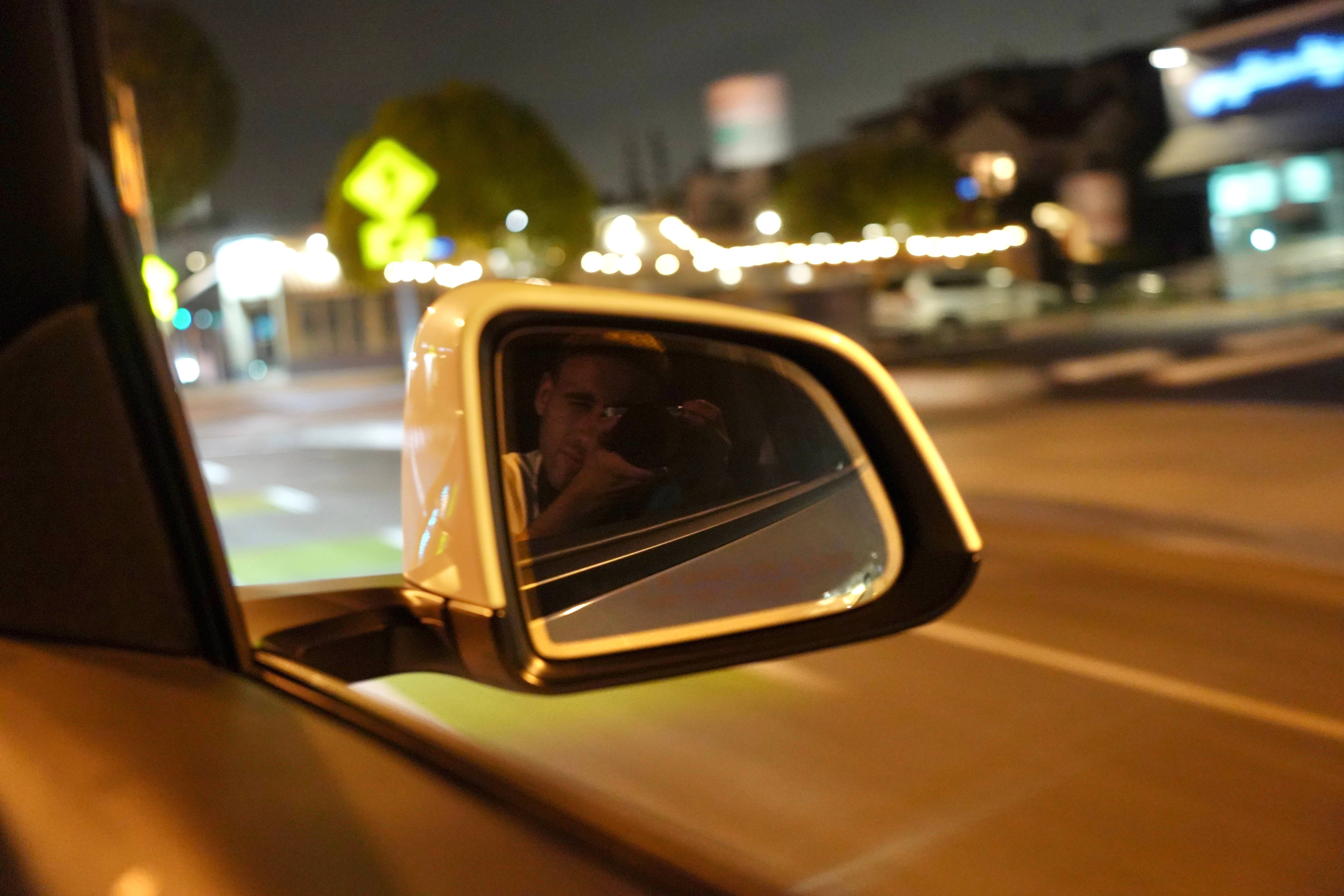 Creative study - Night photography with car mirror reflection